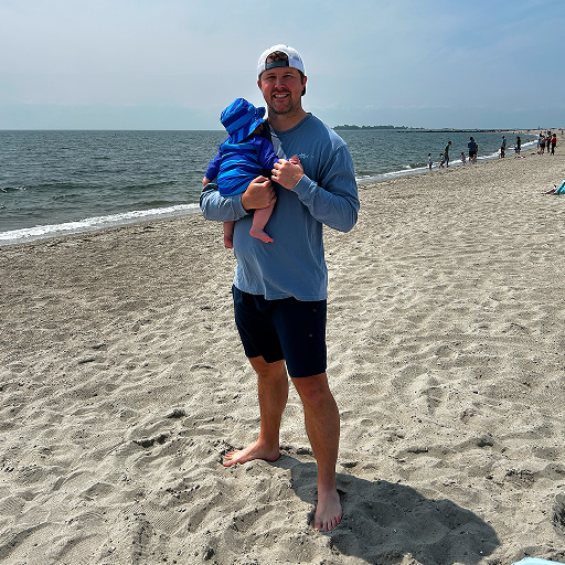 Man wearing Mack Weldon x Bather Swim Trunk